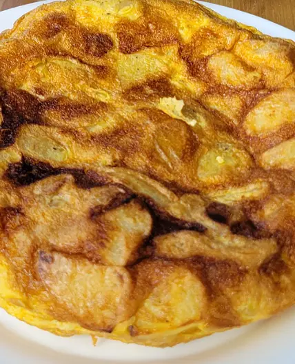 Tortilla de papa de la casa