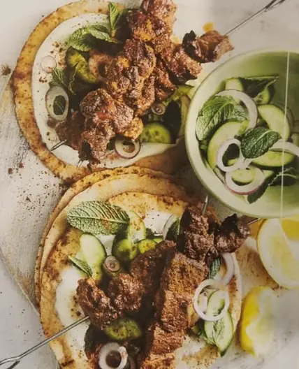 Cinnamon spiced lamb kebabs with yoghurt and pita