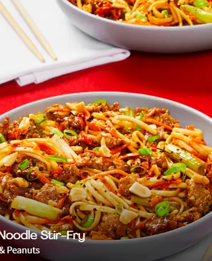 Szechuan Pork Noodle Stir-Fry with Carrot, Scallions & Peanuts