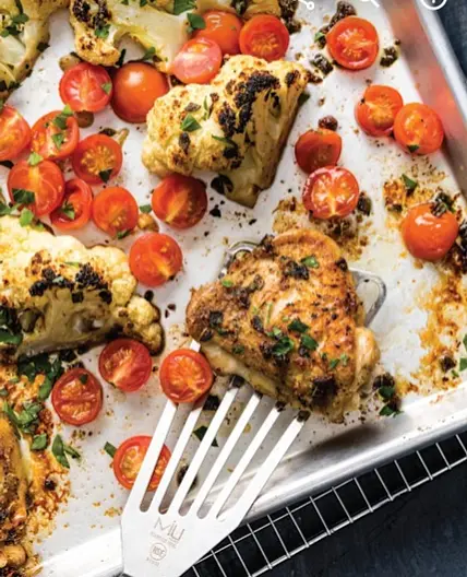 One-Pan Roast Chicken Thighs with Cauliflower and Tomatoes