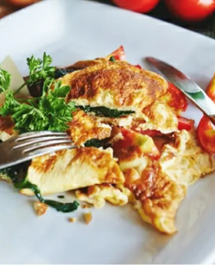 Breakfast 2 Scrambled eggs with spinach, parmesan & tomato