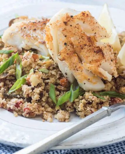 Cajun-spiced cod with cauliflower dirty rice