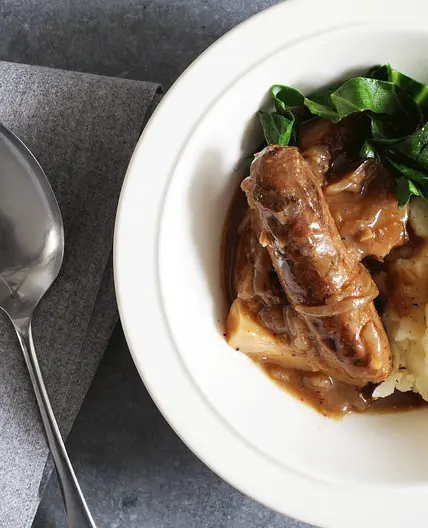 Slow cooker sausage casserole with parsnips and onions