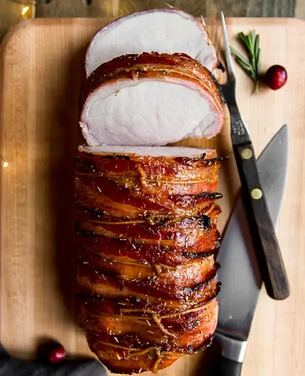 Bacon Wrapped Pork Loin with Cranberry Apricot Glaze