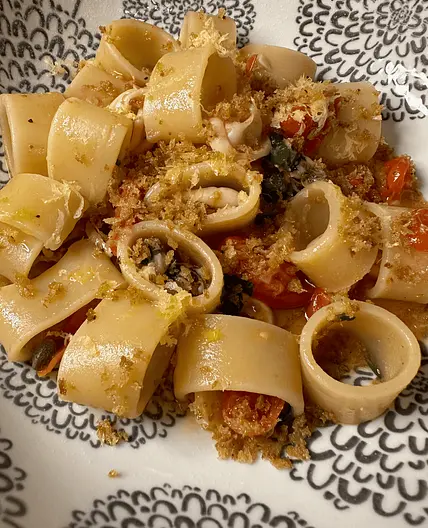 Calamarata (pasta with squid and tomatoes)