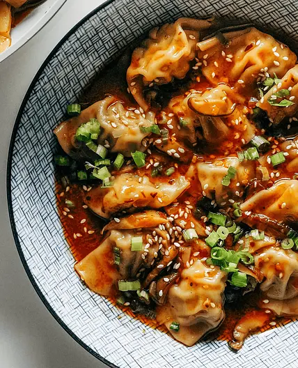 Chicken Wontons in Spicy Chili Sauce
