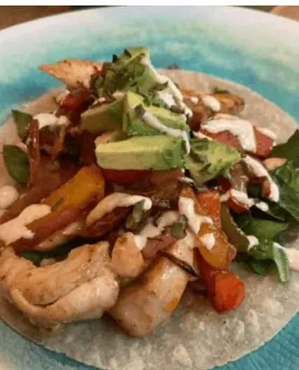 Sheet-Pan Chicken Fajitas with Creamy Lime Crema