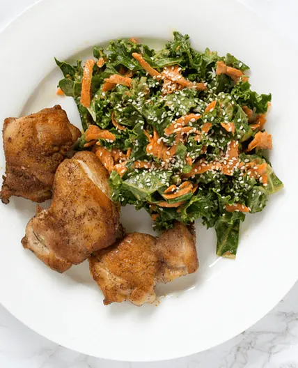 Pan-Fried Chicken Thighs with Thai-Inspired Kale, Carrot & Peanut Salad