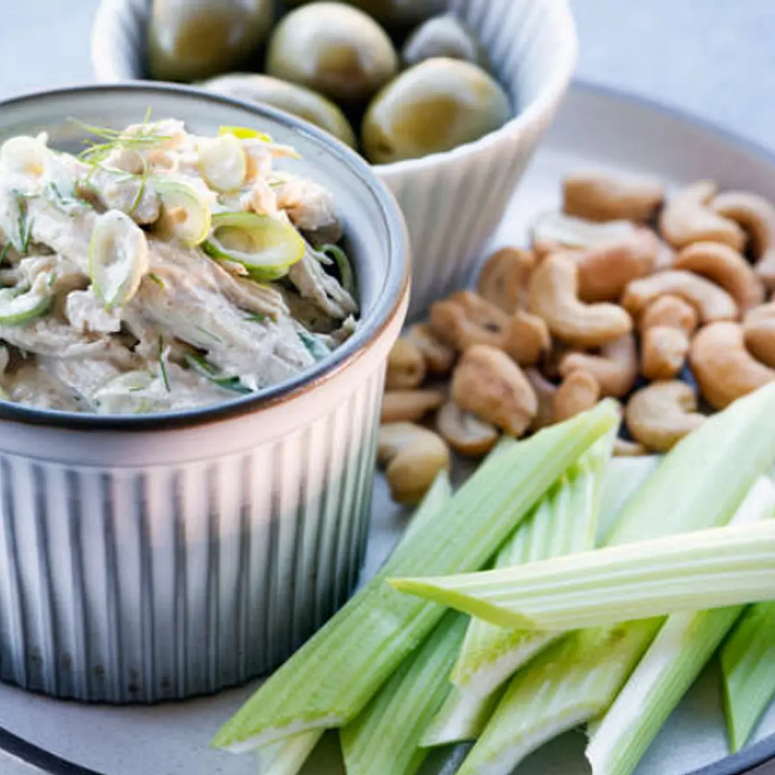 Bento with chicken salad, celery, cashews and olives