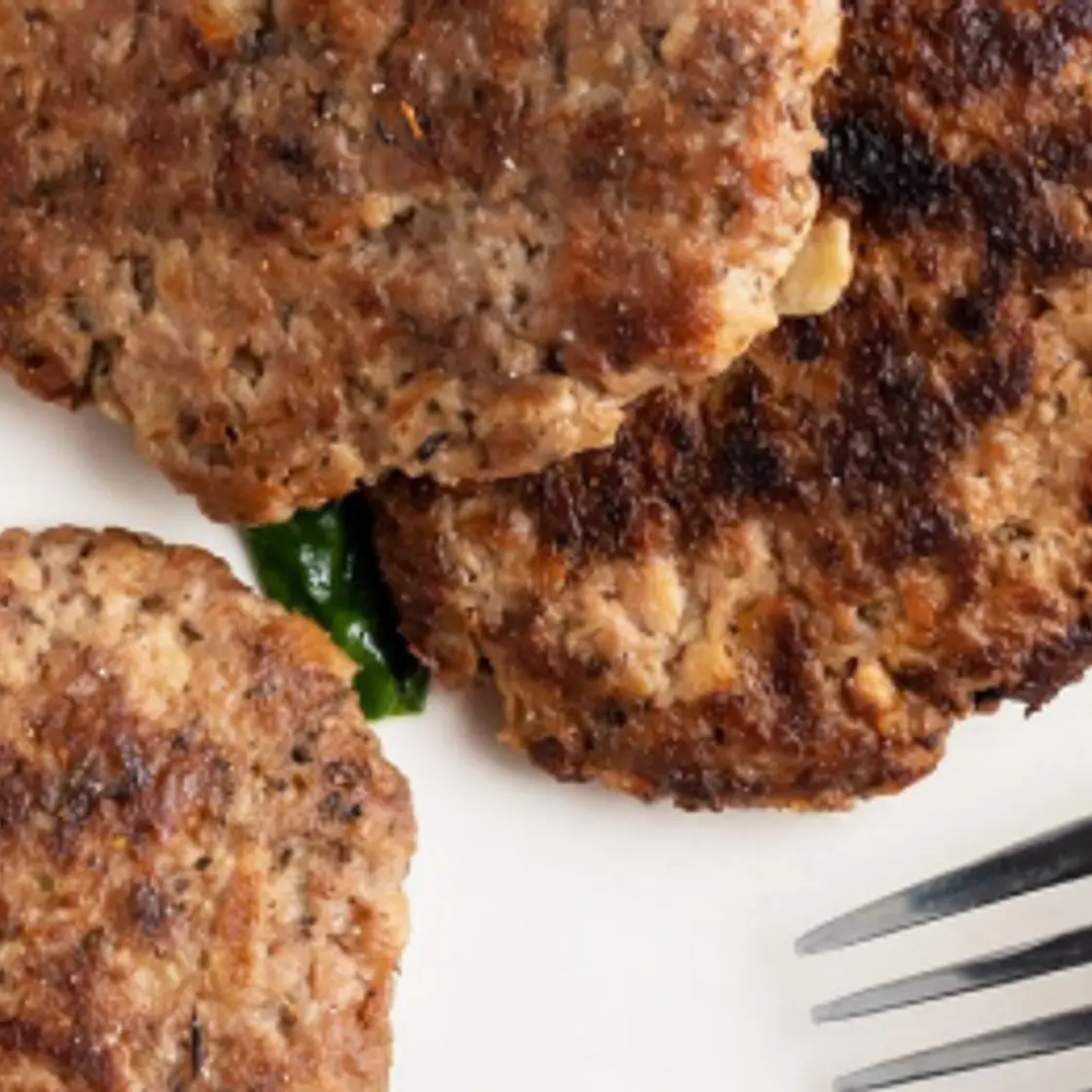 Apple Turkey Sausage Patties with Sauteed Greens