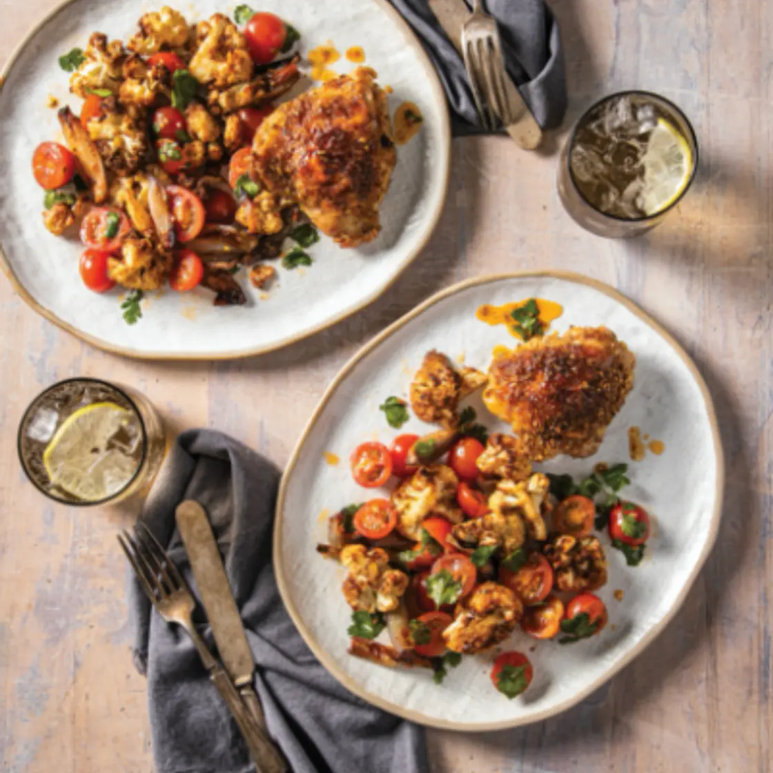 CORIANDER CHICKEN THIGHS WITH ROASTED CAULIFLOWER AND SHALLOTS