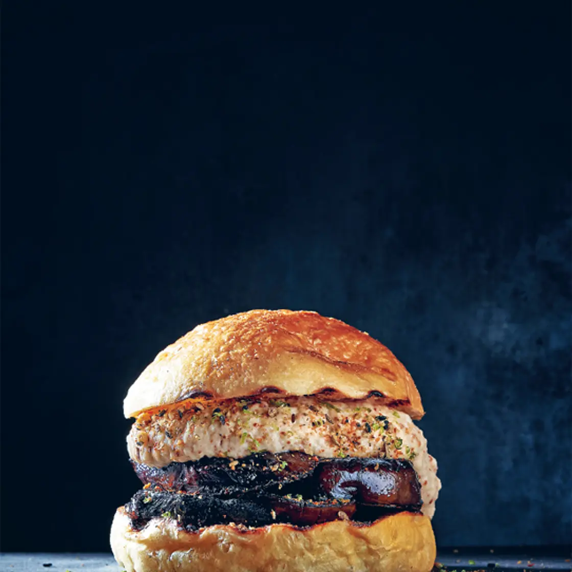 HARISSA-MARINATED AUBERGINE BURGER with baba ghanoush and dukkah