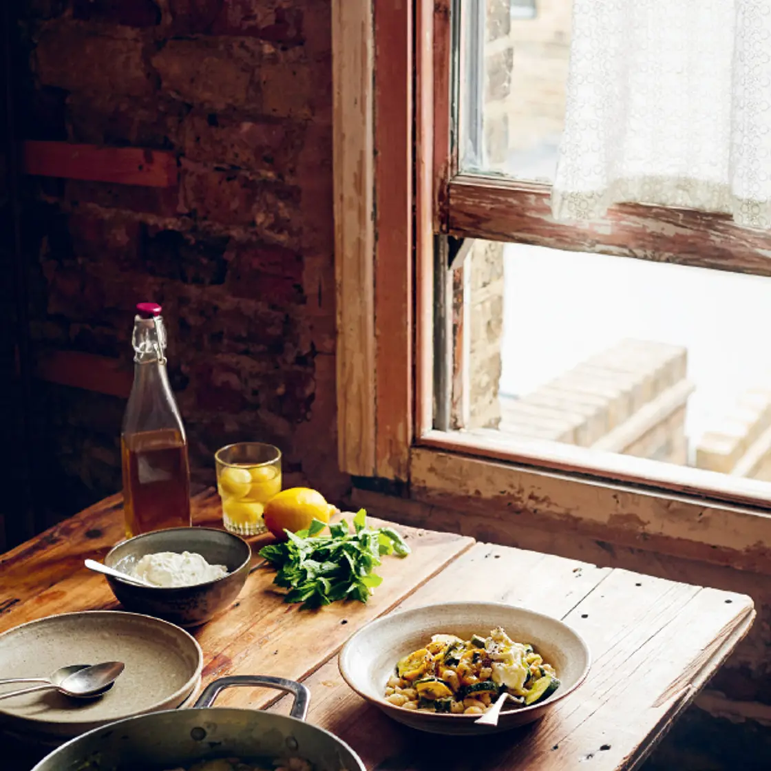 Slow-cooked, minted courgettes with white beans and fresh cheese