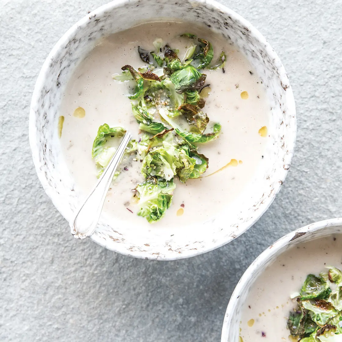 WHITE BEAN SOUP WITH CUMIN SEED + LEMON + CRISPY SPROUT LEAVES