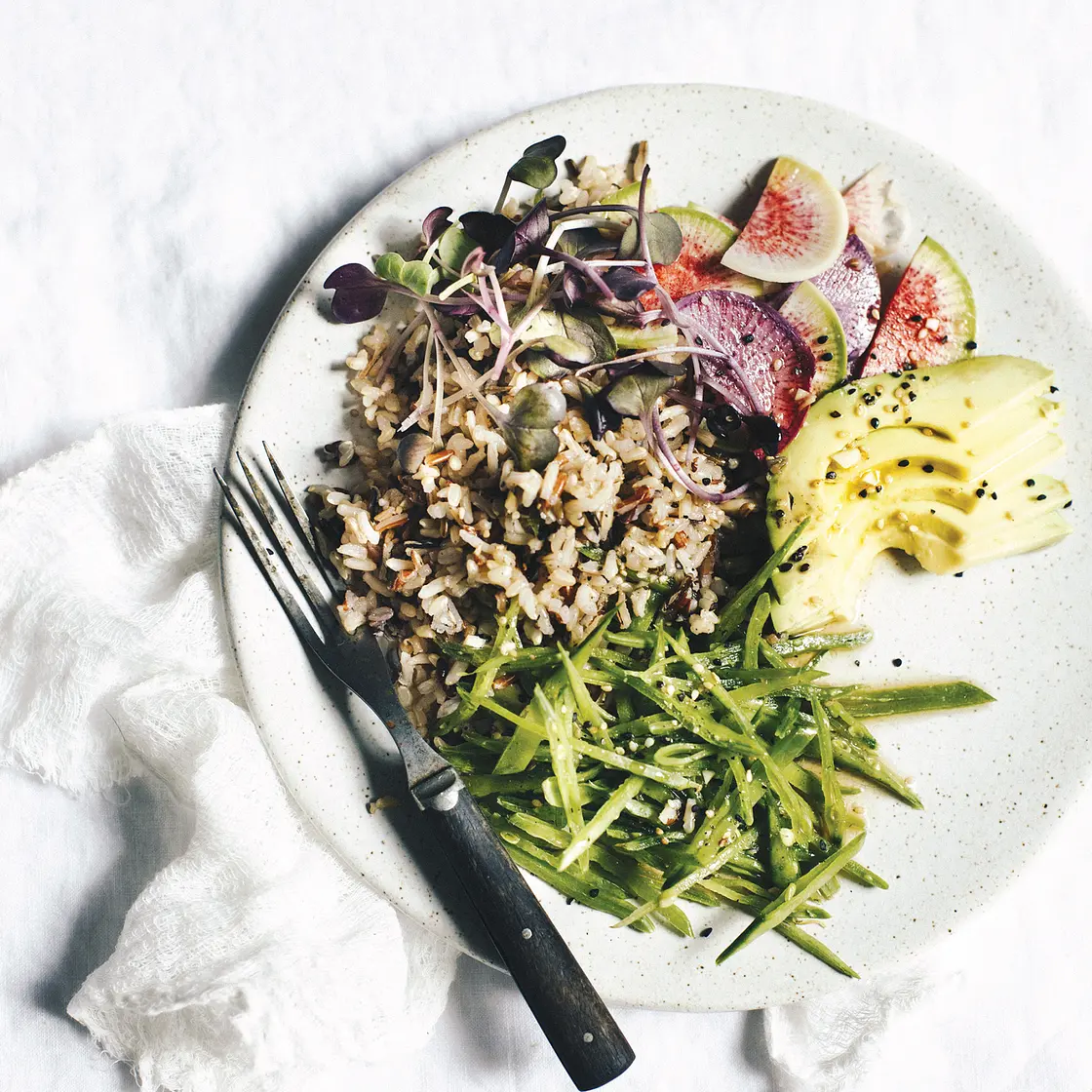 WILD RICE SALAD WITH SNAP PEAS + AVOCADO + RADISH + SESAME GINGER DRESSING
