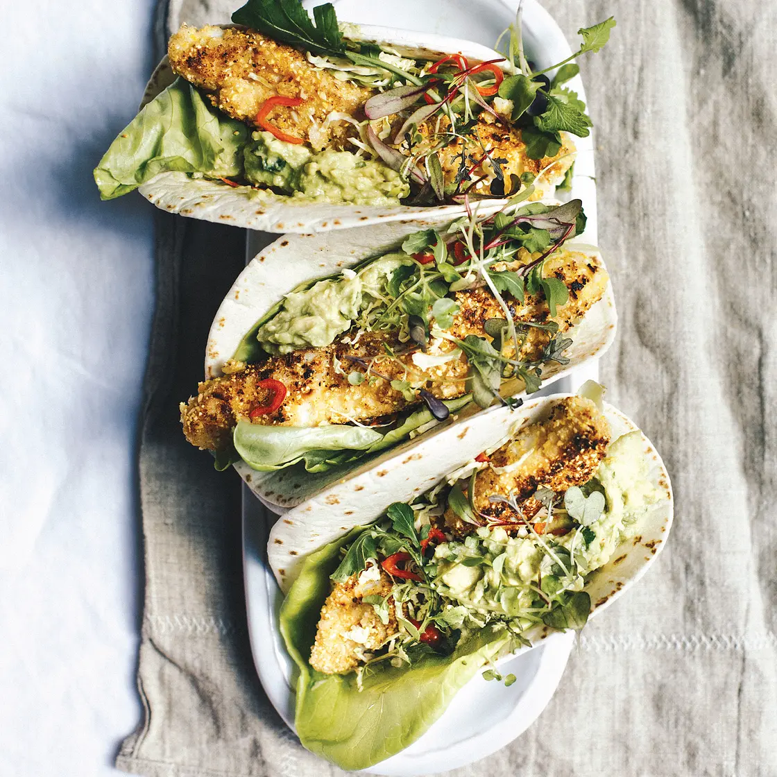 ALMOND-CRUSTED FISH TACOS WITH QUICK PICKLED CHILIES + AVOCADO MASH