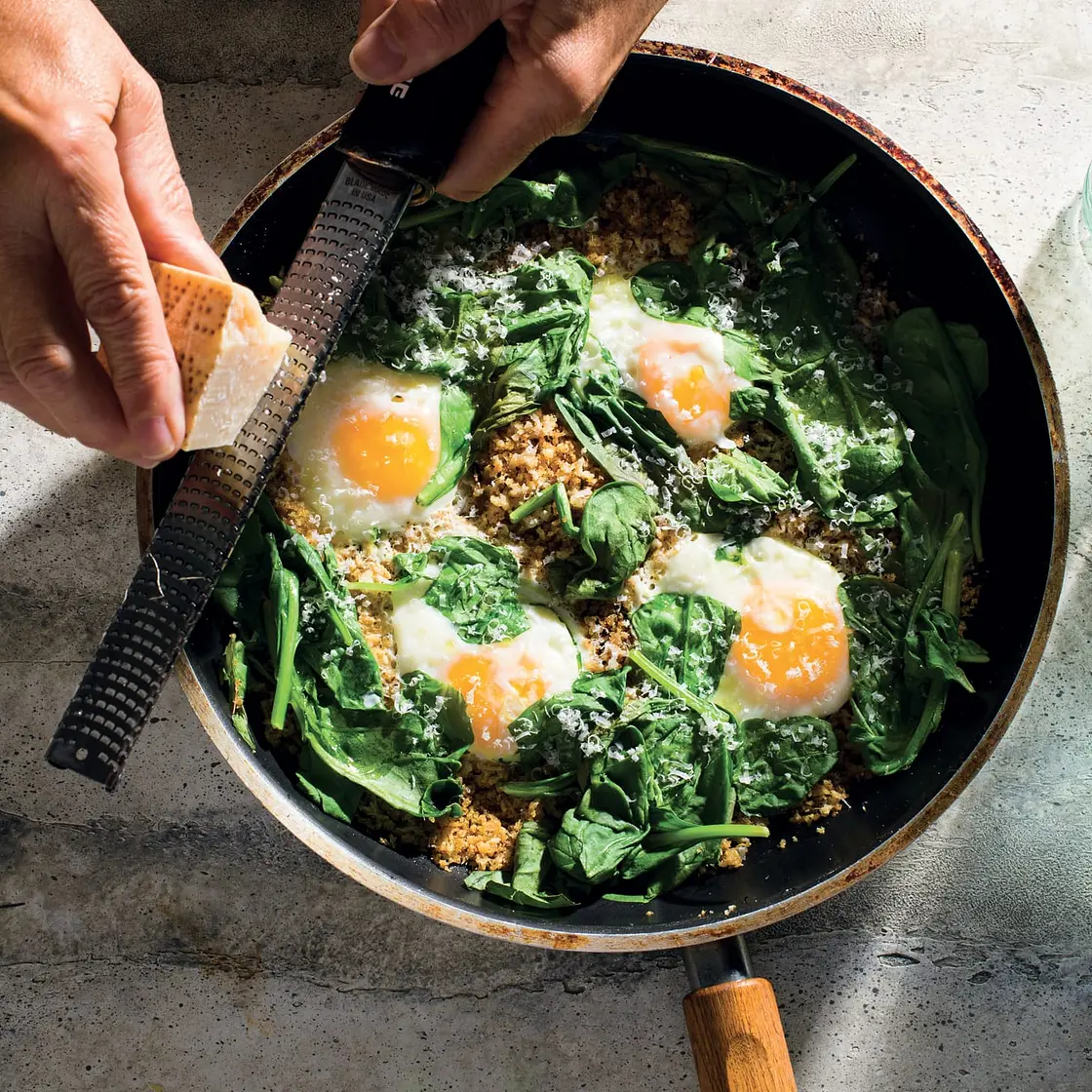 Eggs Fried in Parmesan Breadcrumbs with Wilted Spinach