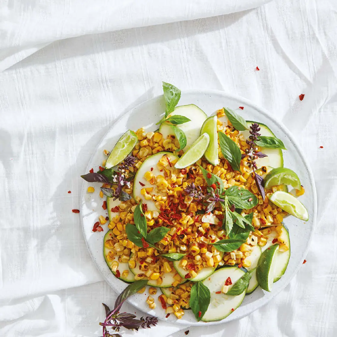 raw zucchini, corn, chile, lime, mint, and more lime