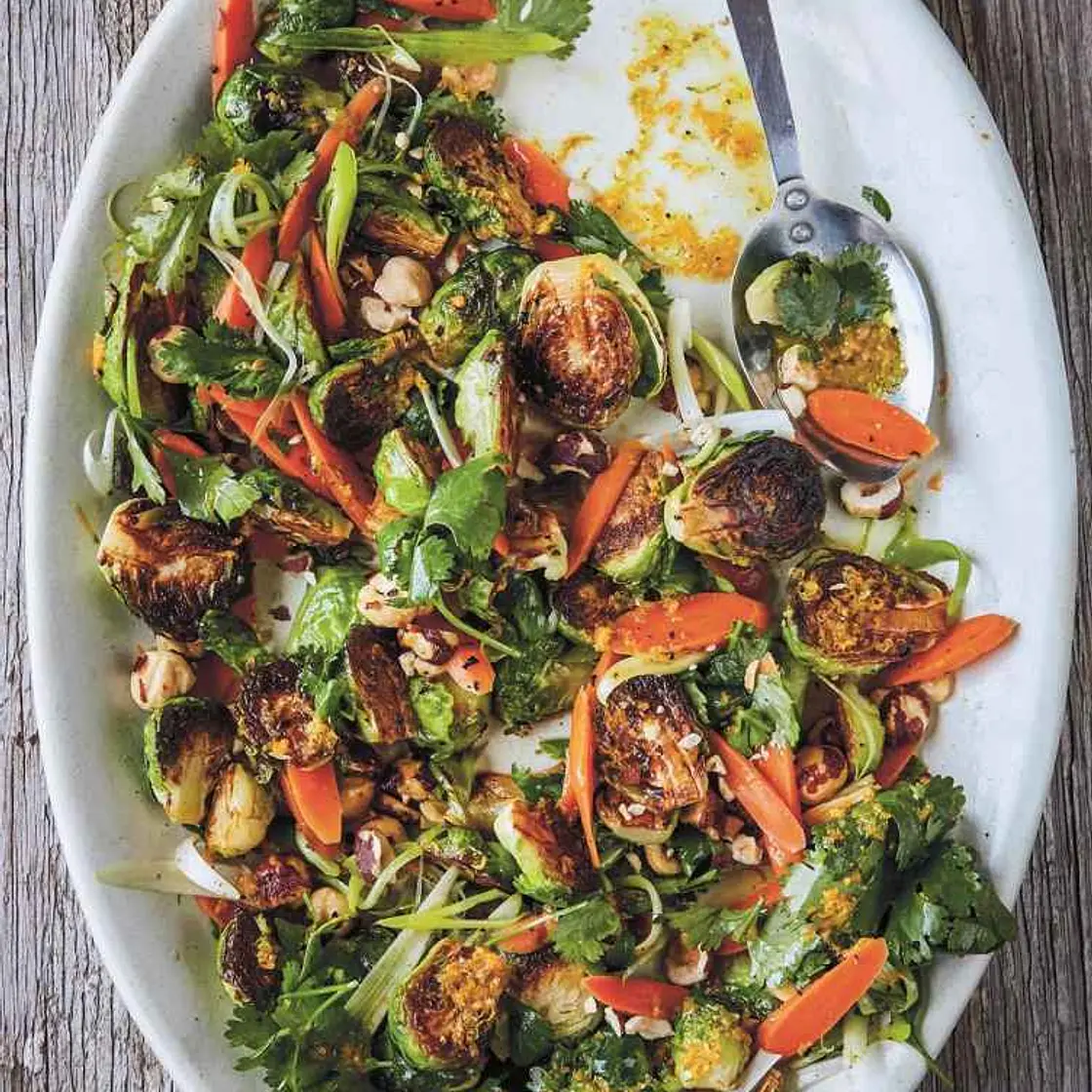 Brussels Sprouts with Pickled Carrots, Walnuts, Cilantro, and Citrus Vinaigrette