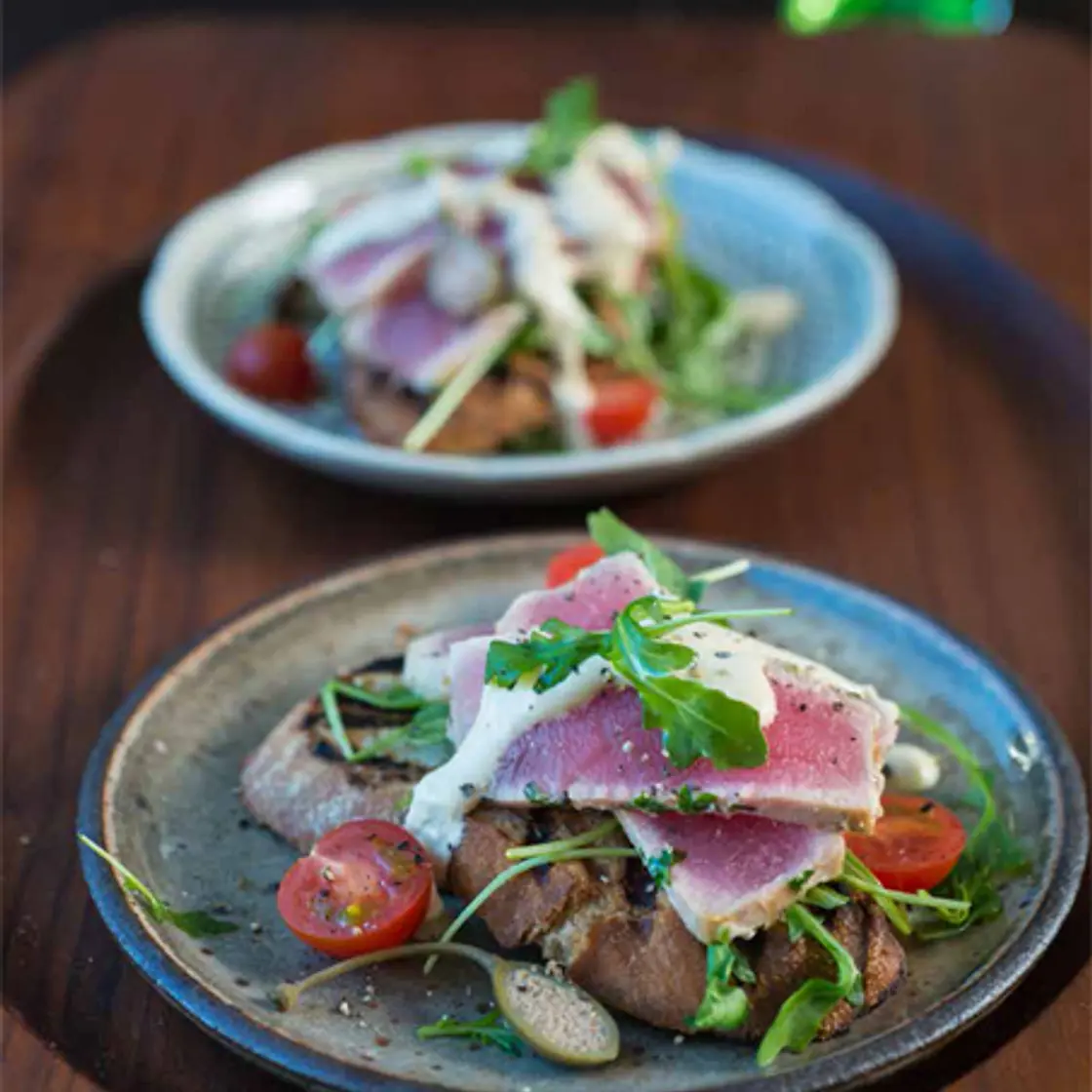 TUNA TONNATO WITH ARUGULA ON GRILLED BREAD