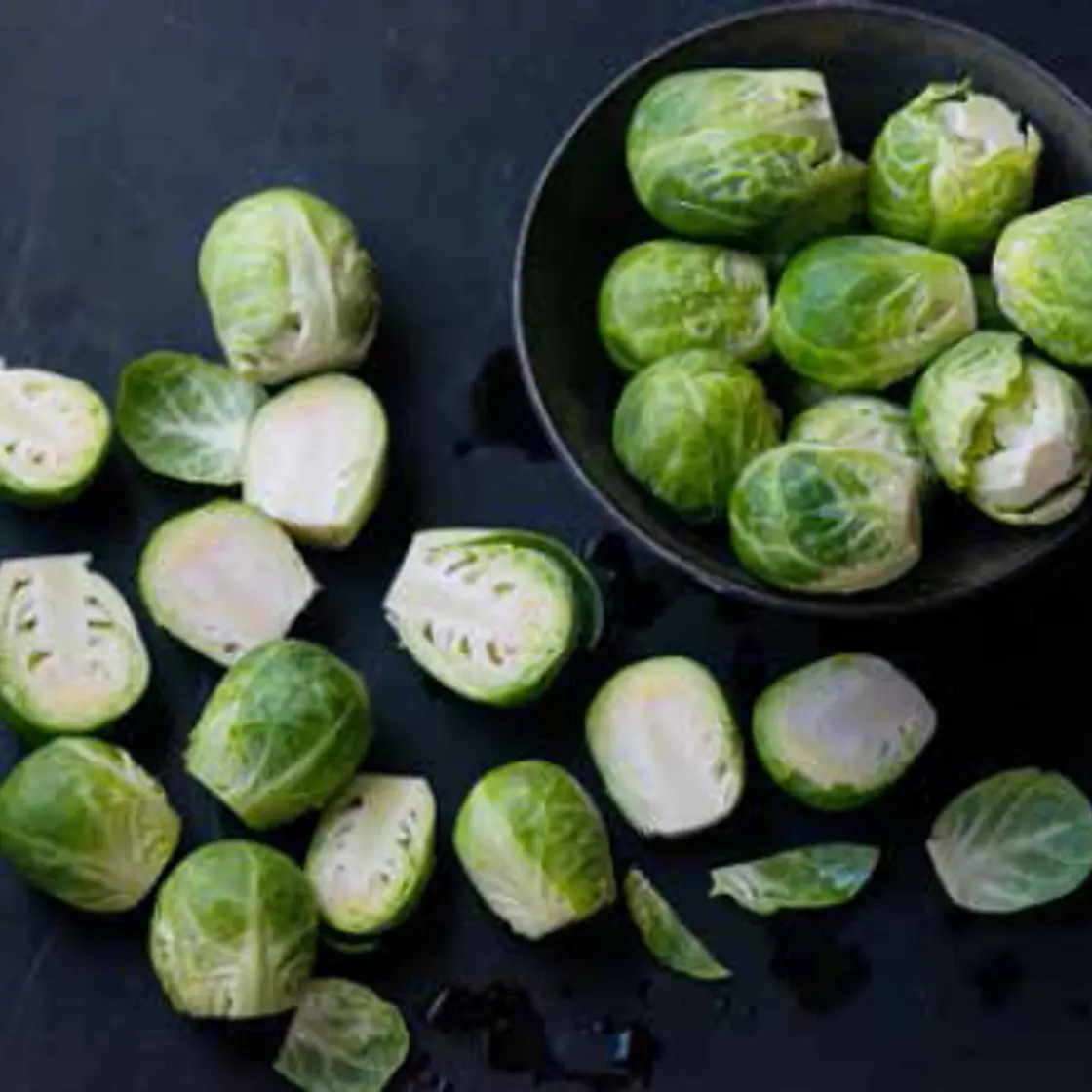 WARM BRUSSELS SPROUTS & KALE SALAD WITH BLUE CHEESE DRESSING