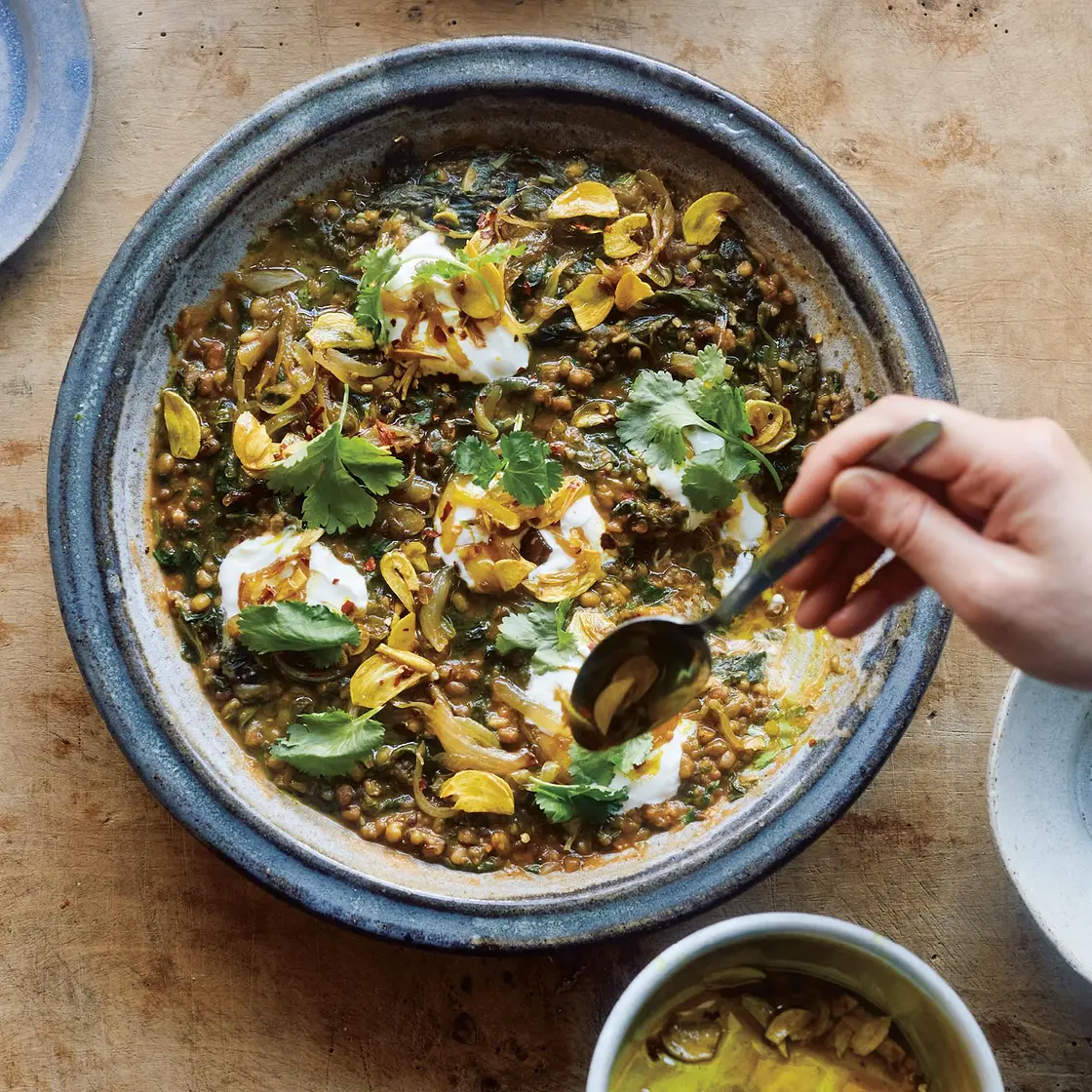 Tamarind, greens, and mung beans with turmeric oil
