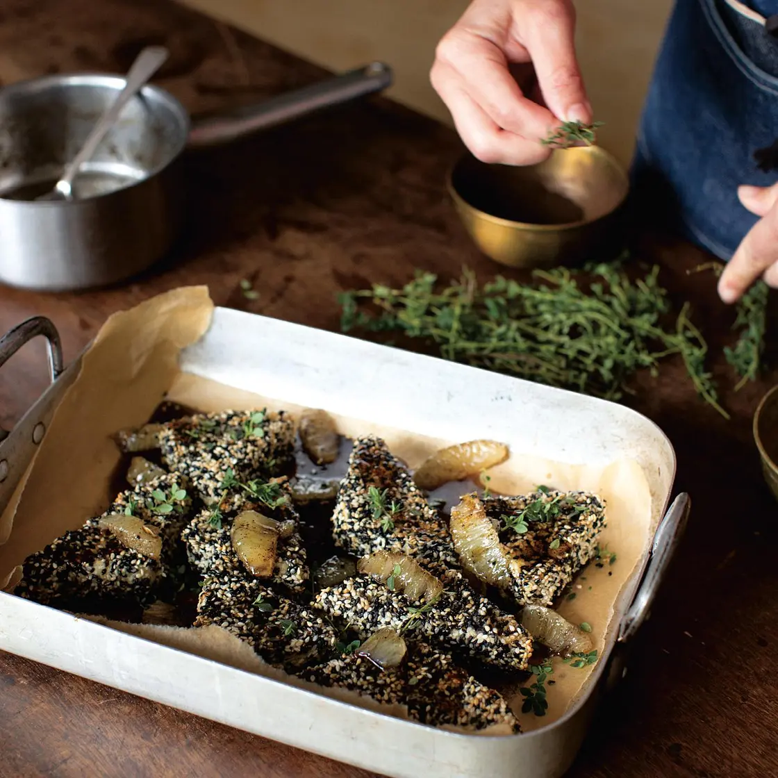 Sesame-crusted feta with black lime honey syrup