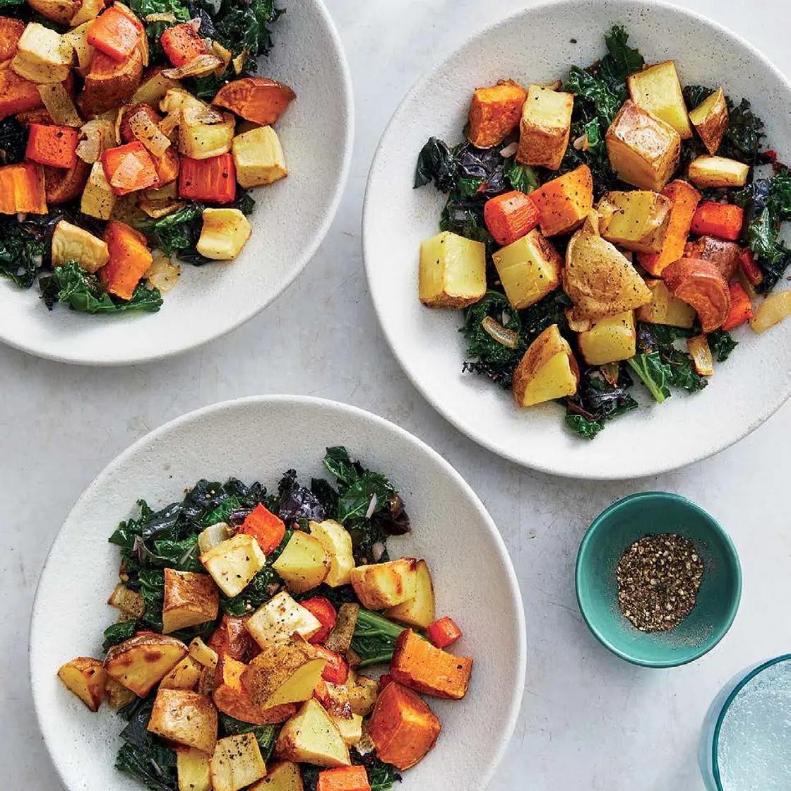 ROASTED ROOT VEGETABLES ON GARLIC– BRAISED GREENS