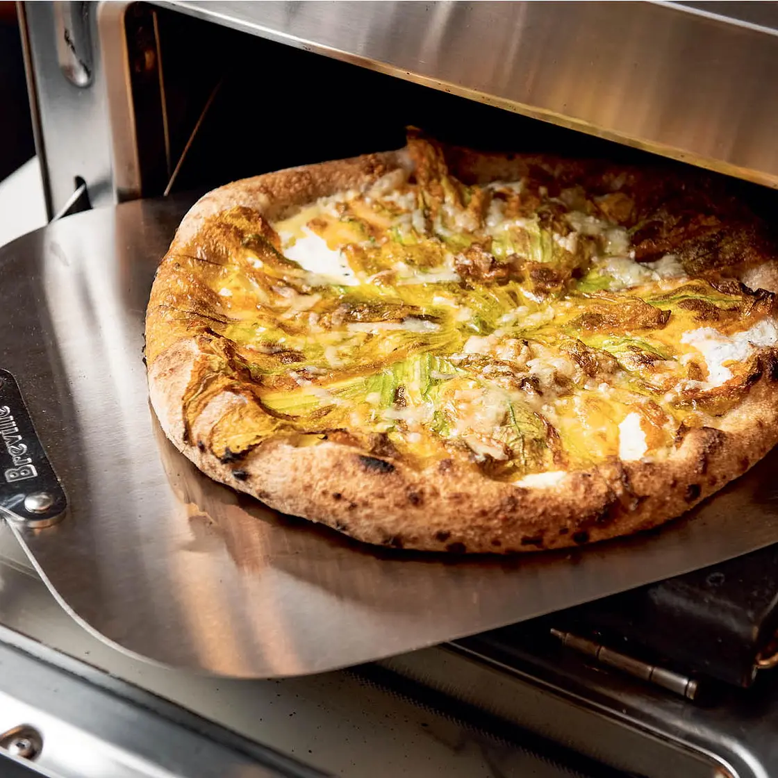 Corn Pizza with Corn Béchamel and Pickled Peppers