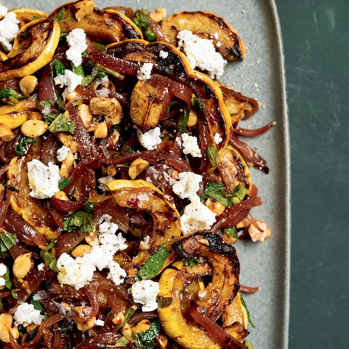 Roasted Delicata Squash with Hazelnuts, Spicy Onions, and Goat Cheese