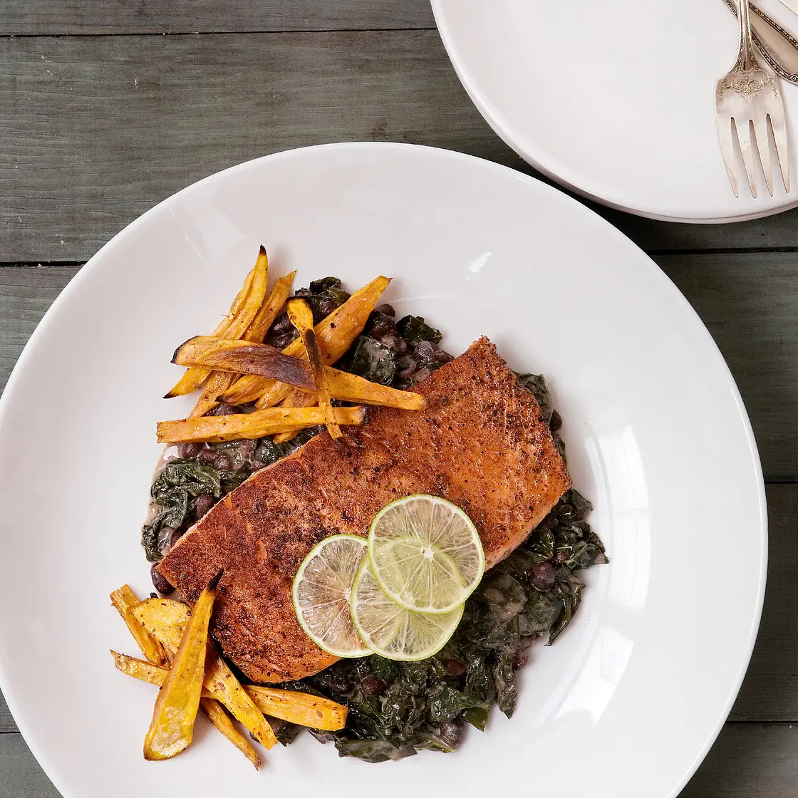 jerk-spiced salmon with coconut pot liquor and sweet potato fries