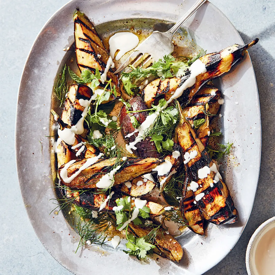 CHARRED EGGPLANT WITH ZA’ATAR AND YOGURT TAHINI