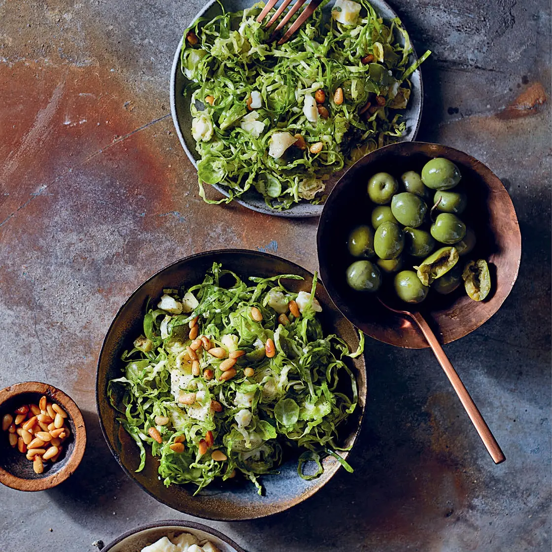 SHAVED BRUSSELS SPROUTS, PINE NUTS, AND GREEN OLIVES