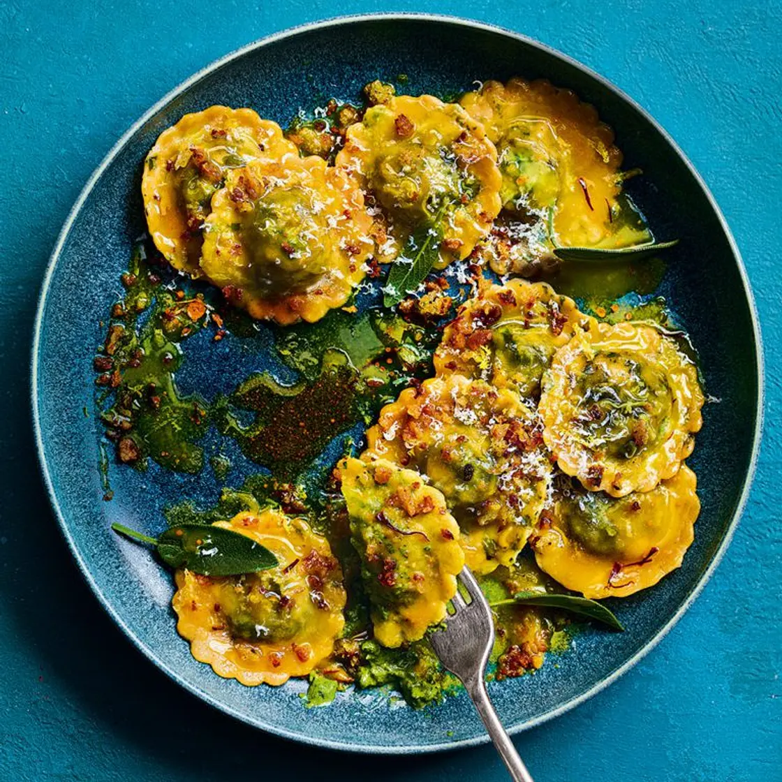 Crab and ricotta ravioli with sage and saffron butter sauce