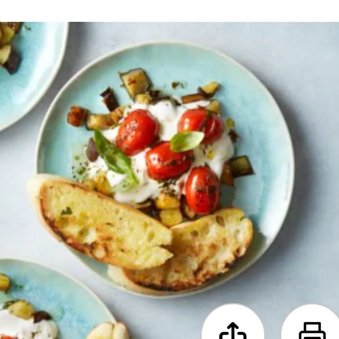 Aubergines met knoflook, gepofte tomaatjes en Jamaica chicken