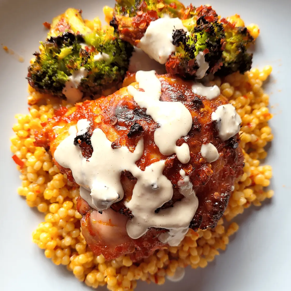 Honey Harissa Sheet Pan Chicken with Broccoli, Couscous, & Lemon Tahini Sauce