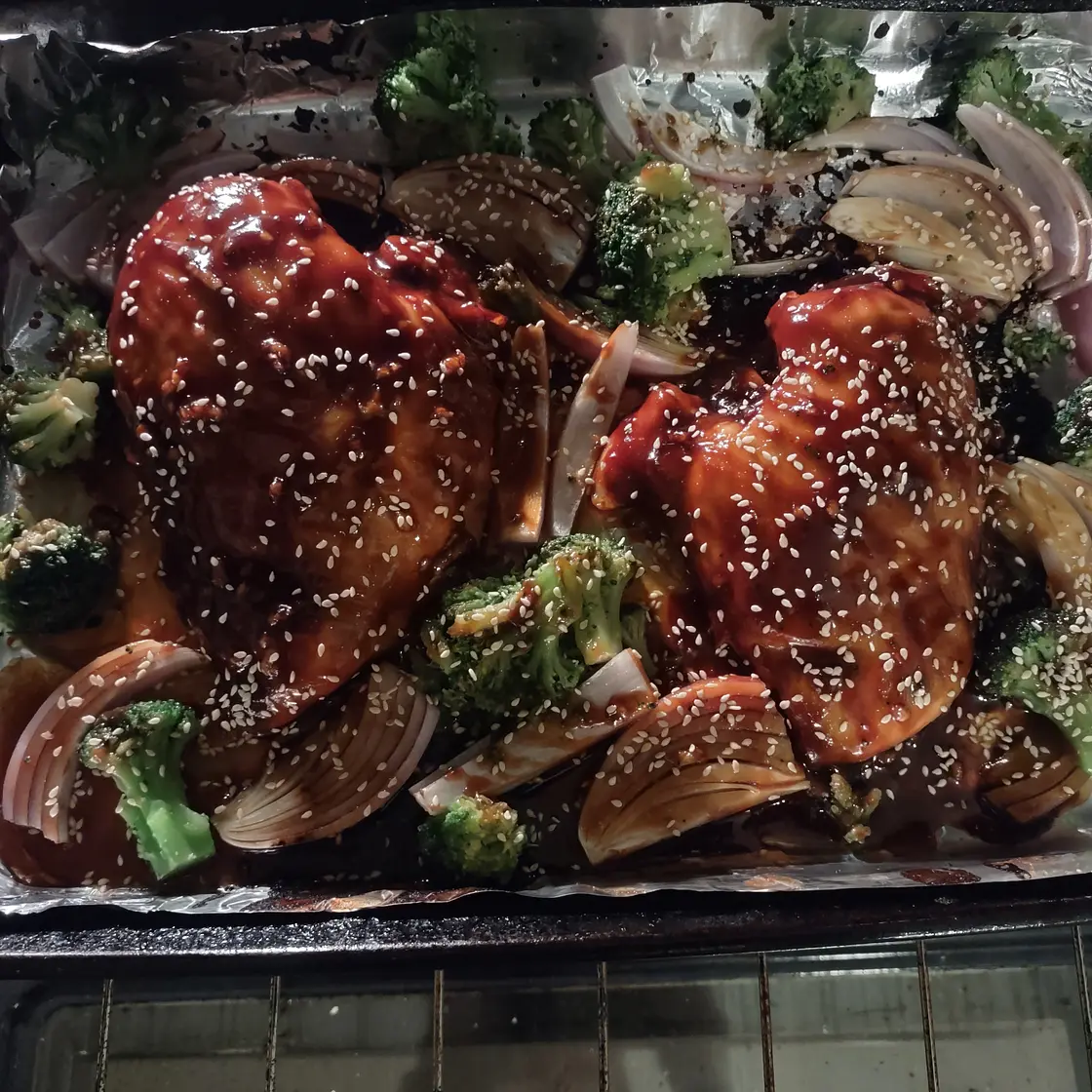 Hoisin Sticky Baked Chicken Breast with broccoli and red onion
