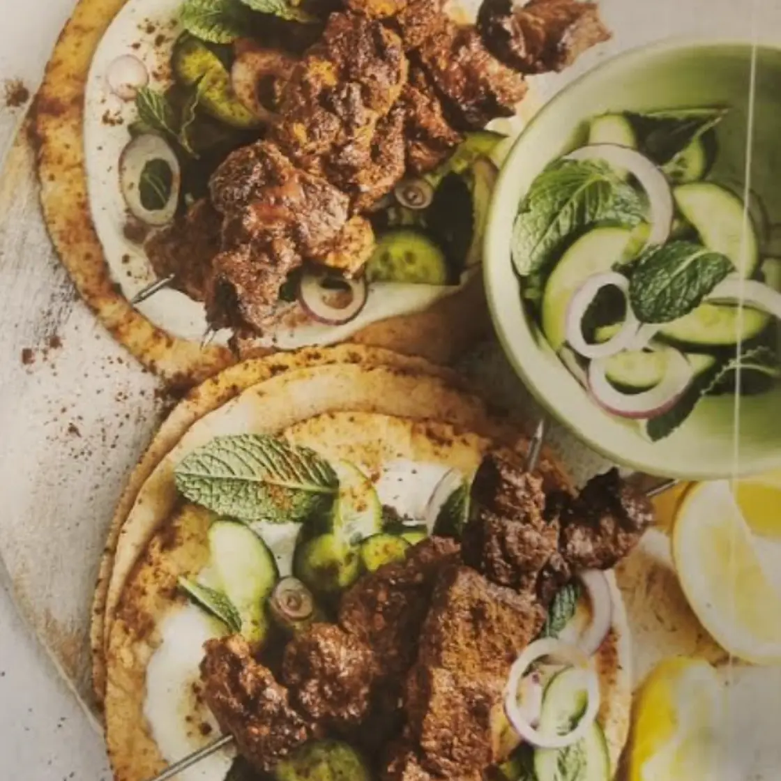 Cinnamon spiced lamb kebabs with yoghurt and pita