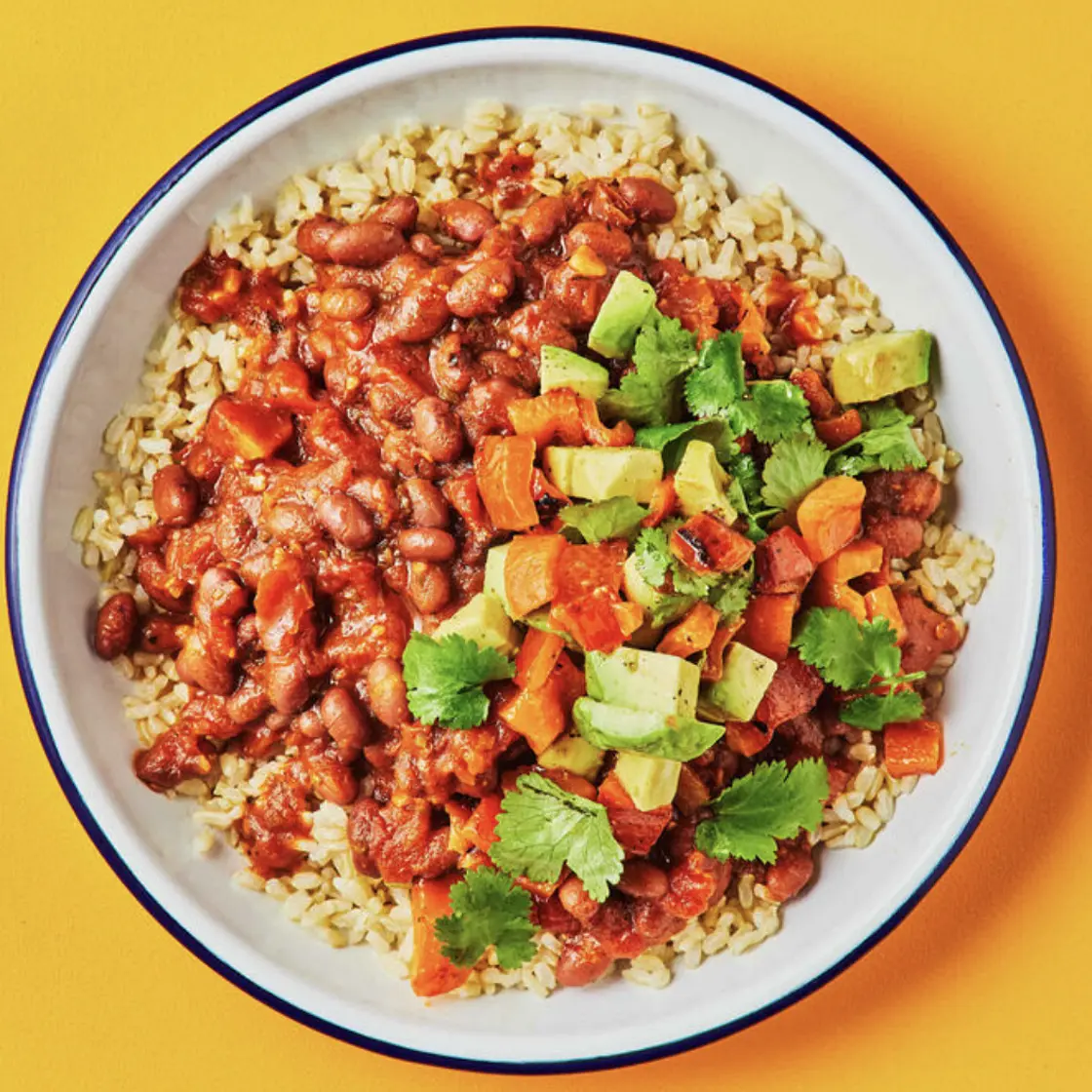 Spicy Cajun Beans

with Brown Rice, Grilled Capsicum and Avo