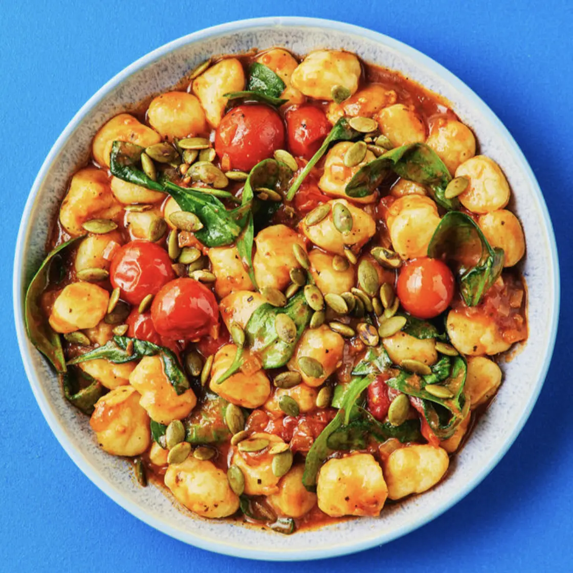 Speedy Tomato and Spinach Gnocchi
with Pepita Crunch