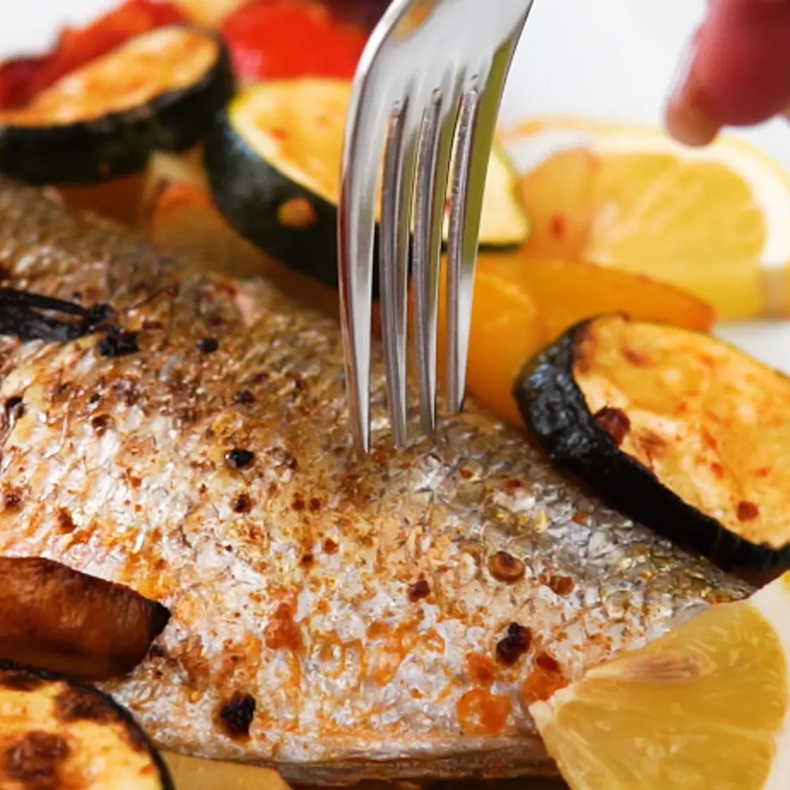 Mediterranean Baked Dorado with Vegetable Medley