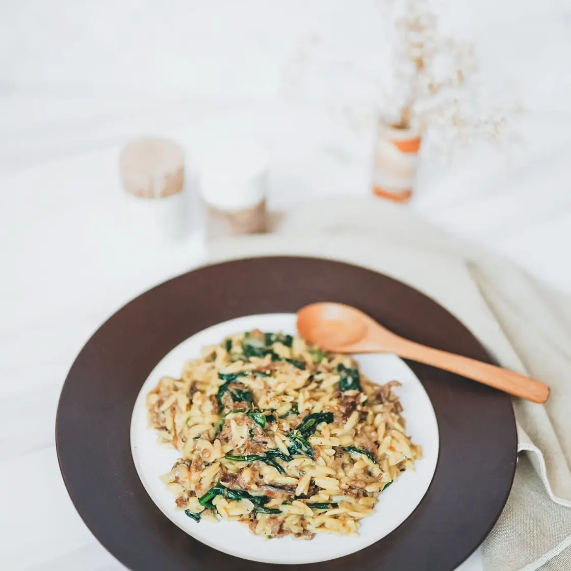 One Pan Vegan Orzo with Spinach and Braised Beef