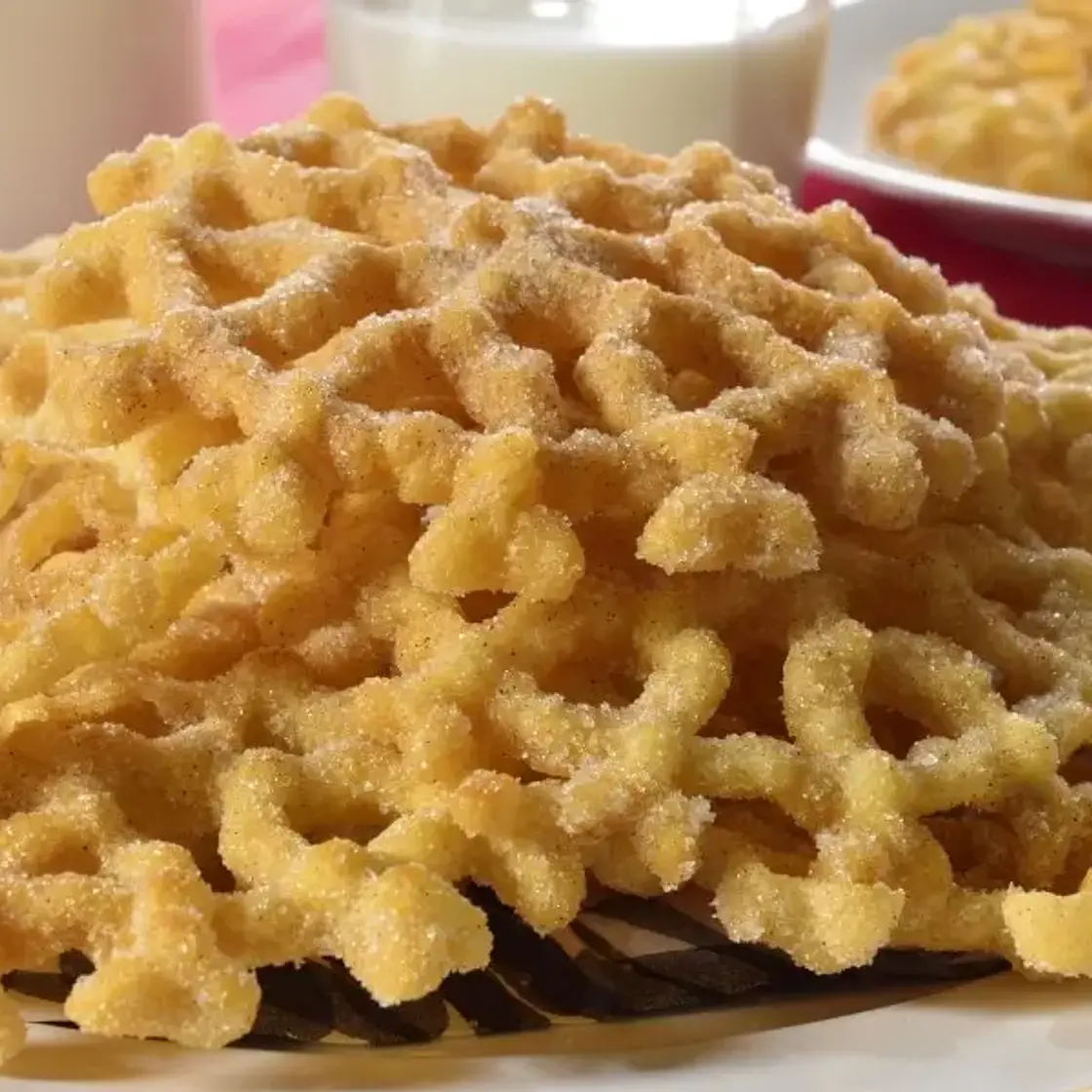 Buñuelos de viento espolvoreados