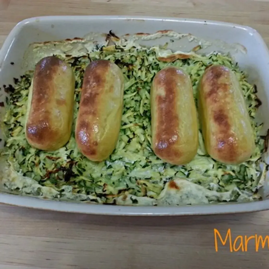 Quenelles sur lit de courgettes