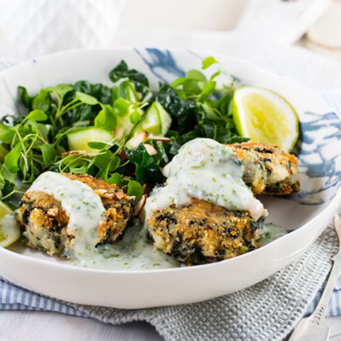 Potato and spinach cakes with almond parsley sauce