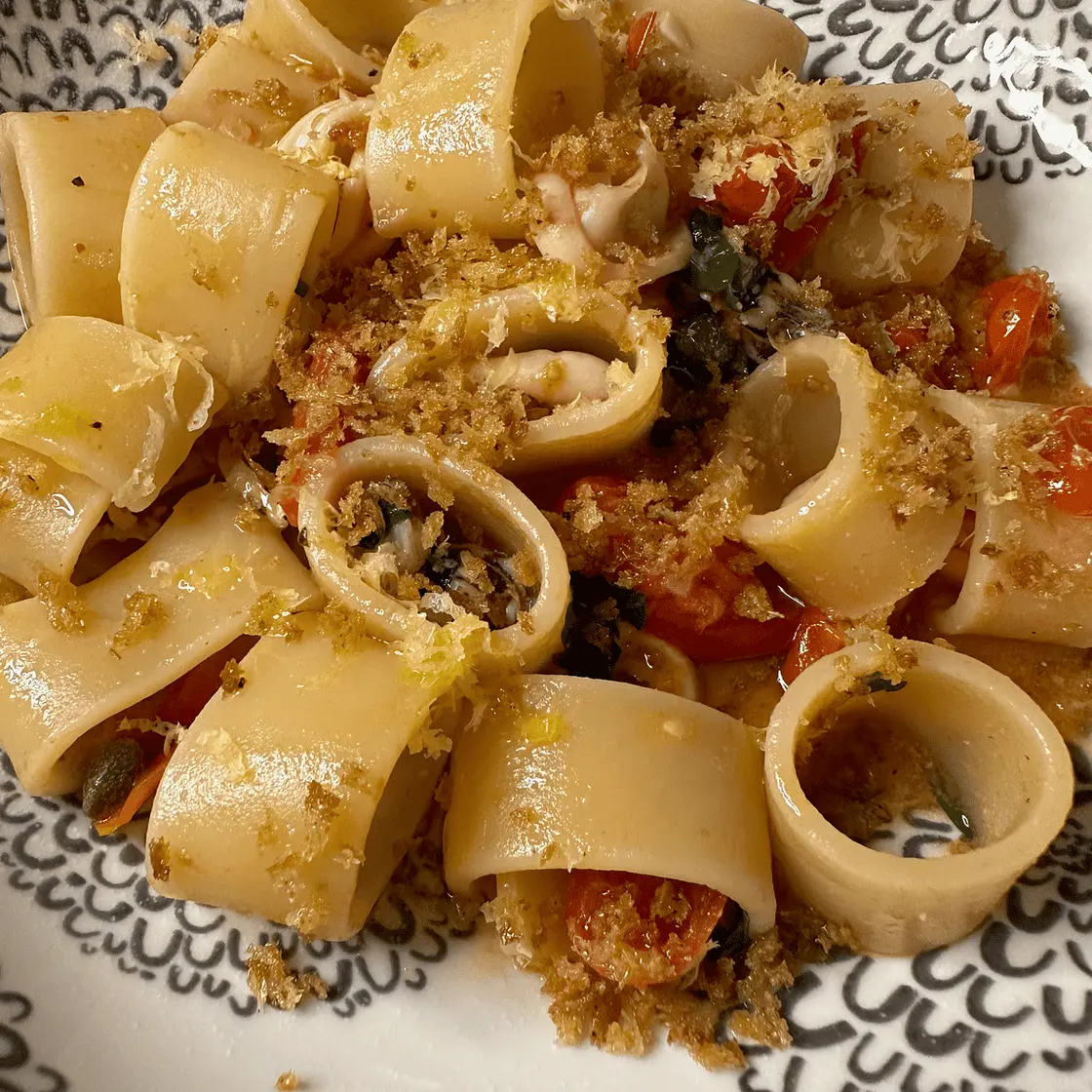 Calamarata (pasta with squid and tomatoes)