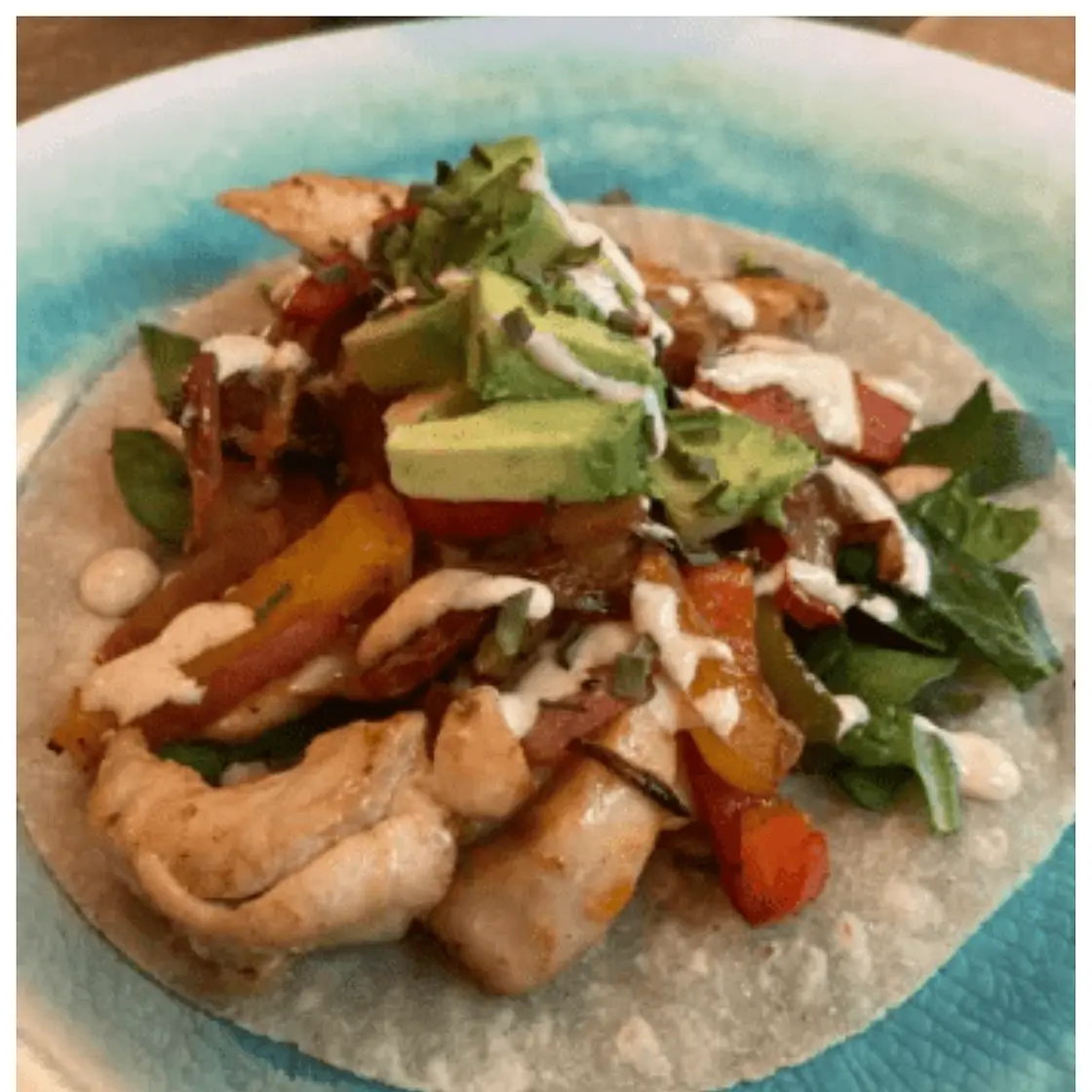 Sheet-Pan Chicken Fajitas with Creamy Lime Crema