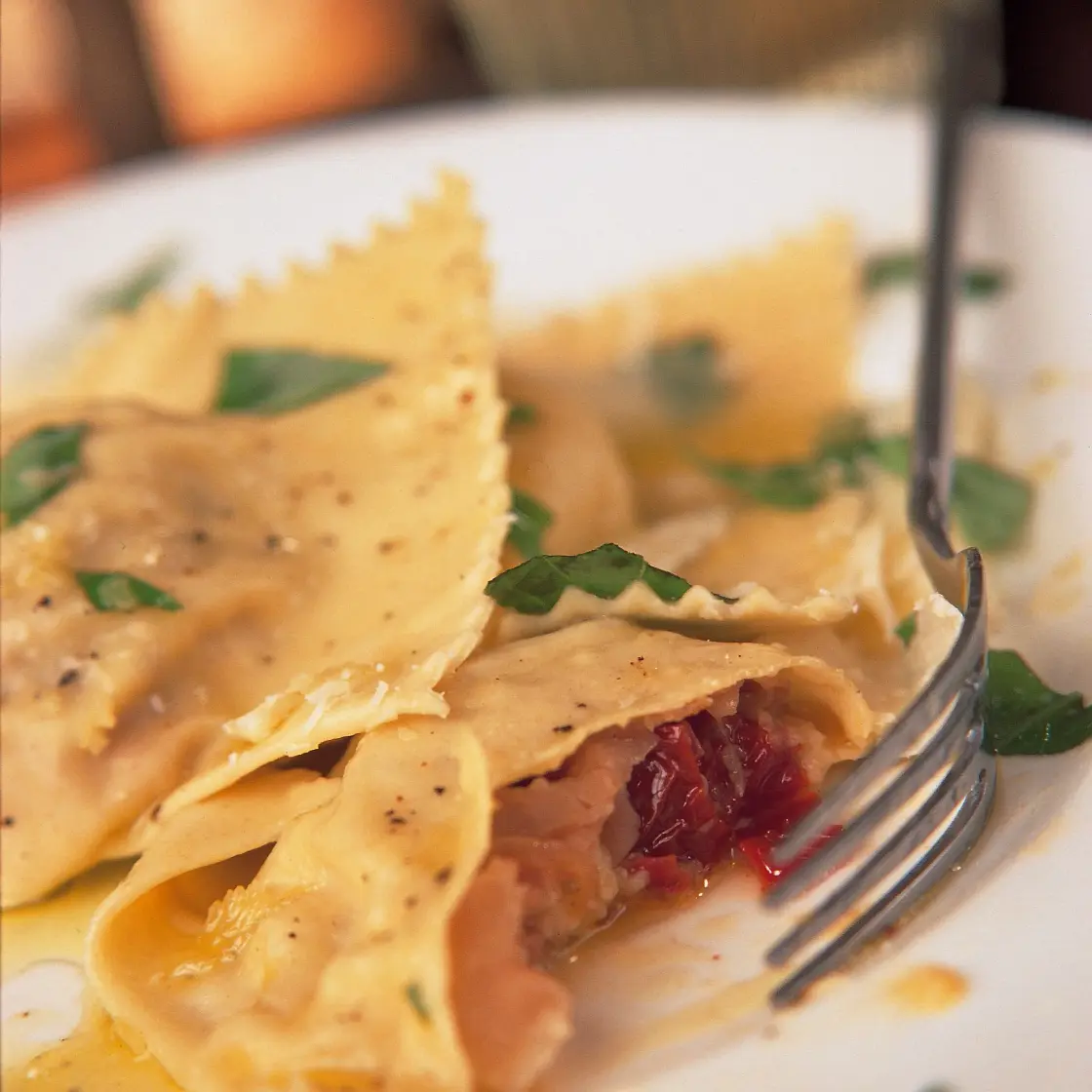 Ravioli with prosciutto, sun-dried tomatoes, basil & mozzarella