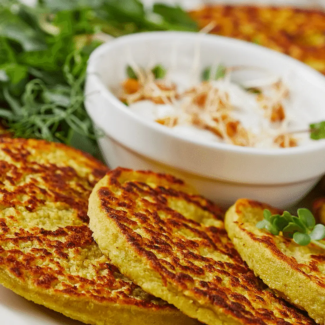Breakfast: green pea pancake with whipped garlic butter