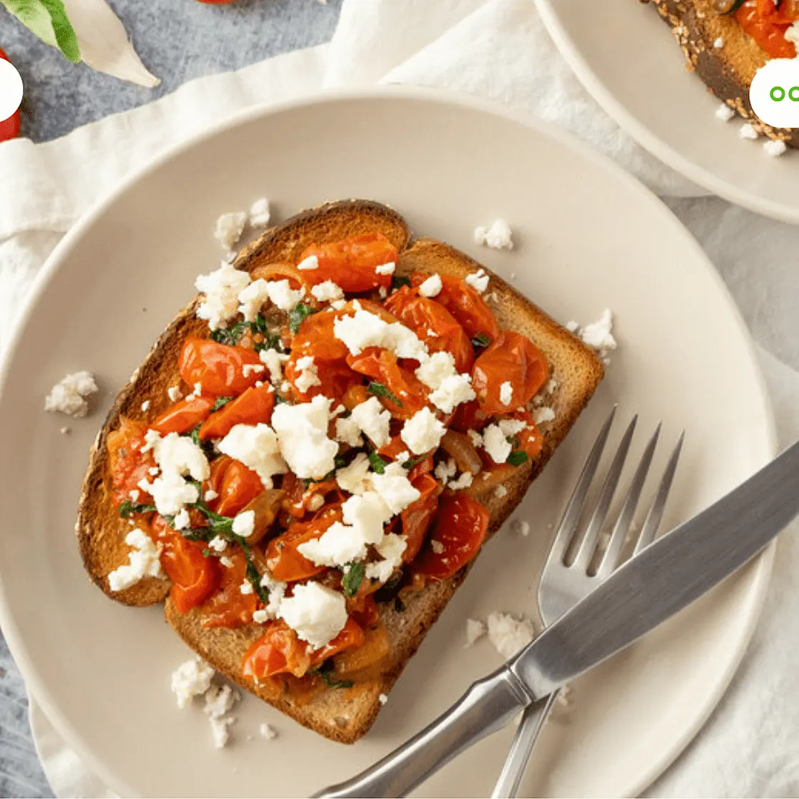 Pan-Fried Cherry Tomatoes with Basil & Feta over Toast
